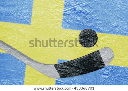 Image Swedish flag and hockey puck with the stick on the ice. Concept