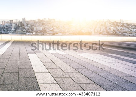 empty brick floor with cityscape and skyline of tokyo at sunrise