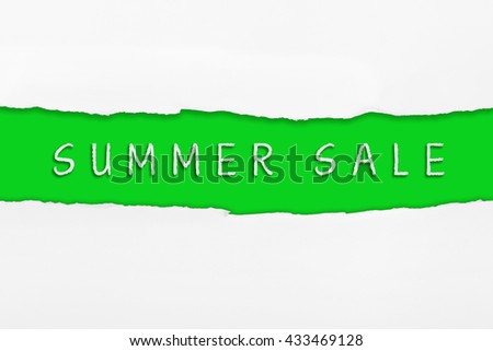 Torn paper with a SUMMER SALE word on green background.