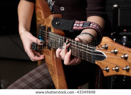 hands on guitar string