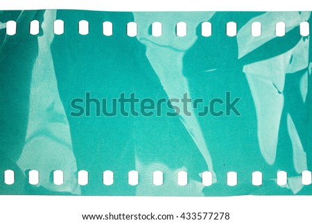 Blank crumpled noisy cyan filmstrip isolated on white background