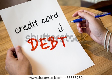 Text "credit card debt" on paper. Royalty-Free Stock Photo #433585780