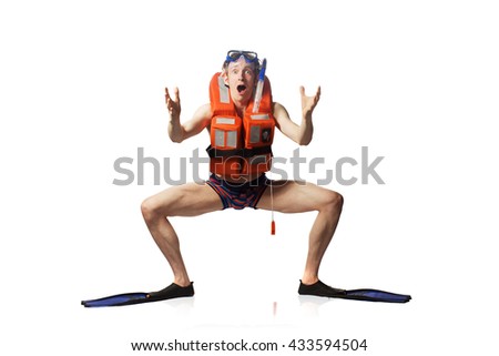 Caucasian adult funny skinny man with emotion face in mask for diving, stripe underwear, lifejacket and flippers posing isolated on white background with copy space.