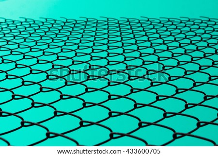 metallic net with green background.  Can be used for design, websites, interior, background, backdrop, texture creation, the use of graphic editors and illustration.