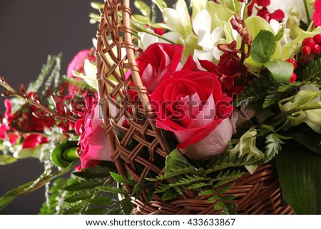 Bouquet of roses in a basket with decoration