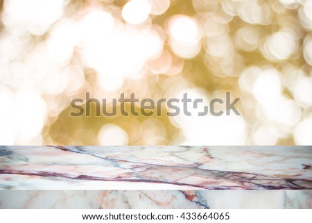 white marble stone countertop or table on backdrop blurred nature background / for display or montage your products