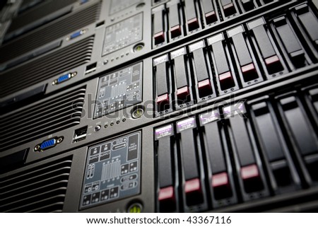 Servers stack with hard drives in a datacenter