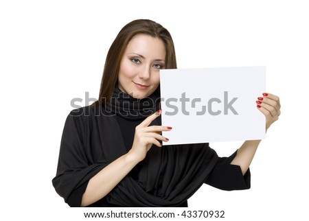 young woman holds the white sheet of paper