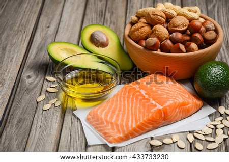 Selection of healthy fat sources, rustic background, selective focus, copy space Royalty-Free Stock Photo #433733230