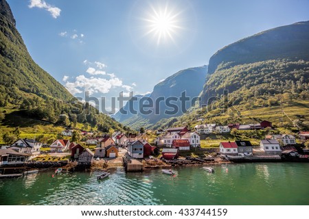 Beautiful Fishing village Undredal against mountain near the Flam in Norway Royalty-Free Stock Photo #433744159