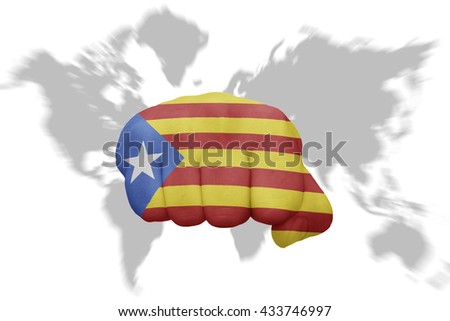 fist with the national flag of catalonia on a world map background
