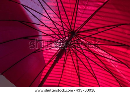 open red umbrella close up inside