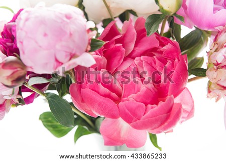 Close Up of Bouquet of Pink, White, and Orange Colored Peonies