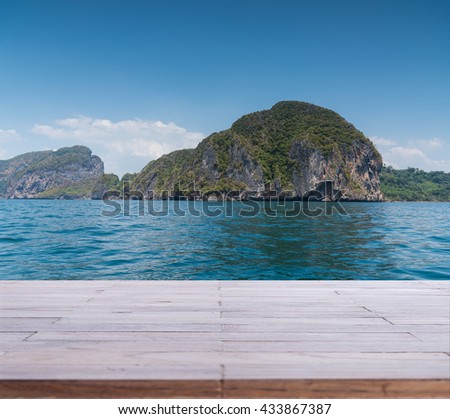 Wood table top or flooring on the beach background, can you use for display your products