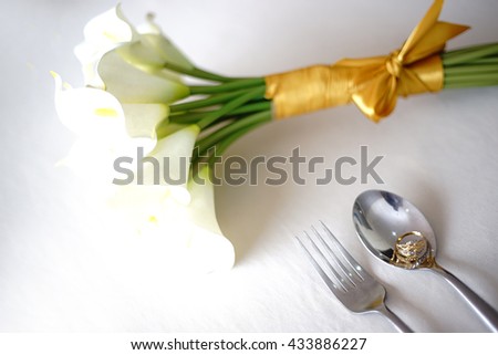 bride hand and wedding flowers. wedding ring