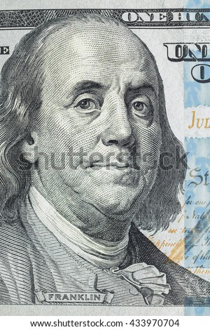 Macro shot of hundred dollar bills