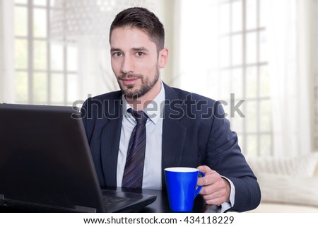 Businessman having a cup of coffee 