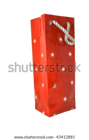Red gift bag with stars isolated against white background