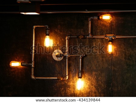 Wall lamp with protection from electrical outlets .