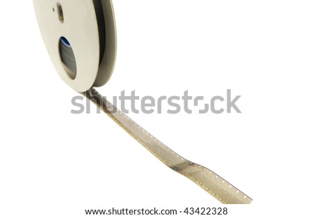  Old film reel with film isolated on white focus on leader