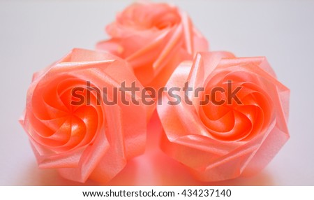 Rose   fower, crafts made of ribbon. On White background