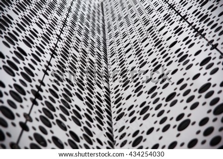 Abstract background: angle of the metal panels in black and white circles