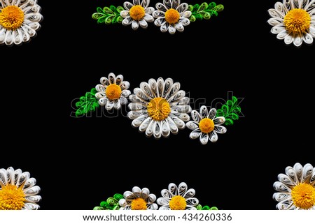 Artificial decorative paper flowers chamomile in the style of quilling. Daisy carton handmade flower frame template isolated on black background. Pattern with free space for design or text.