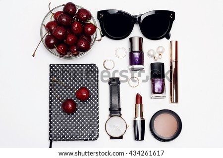 Flat lay photography essential accessories for woman. Overhead view of beauty items