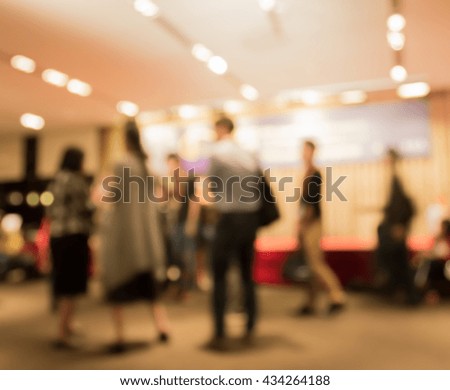 Abstract blurred business people at press conference event in hall