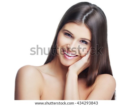 happy beautiful young woman with long healthy hair, isolated against white studio background