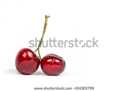 cherries isolated , two together, bound