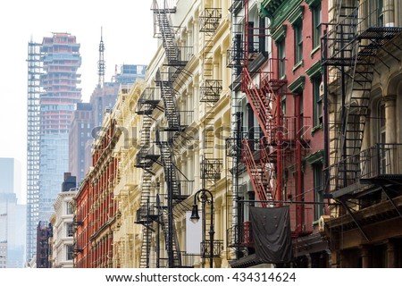 Long row of colorful buildings in the Soho neighborhood of Manhattan, New York City Royalty-Free Stock Photo #434314624