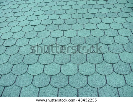 Blue-green fish scale tiled roof
