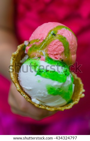 Ice cream in the girl hand 