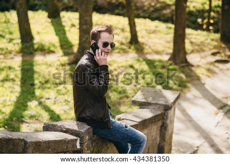man with a phone on the street