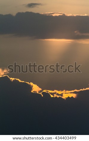 Sunbeam through the haze on blue sky: can be used as background and dramatic look, Ray of lights through the clouds
