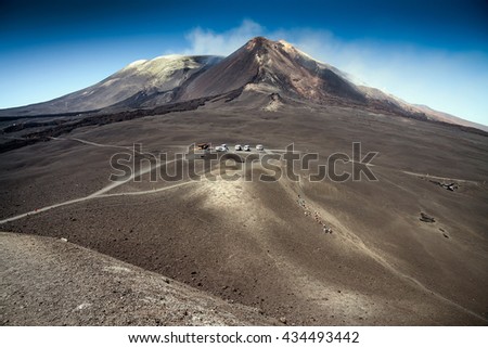 Hiking on the top of Etna mount, the biggest active volcano in Europe, Sicily island, Italy