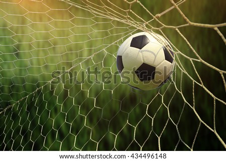 soccer ball in goal Royalty-Free Stock Photo #434496148