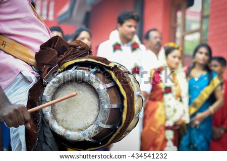 Tribal musical instruments for a traditional South Indian wedding. This is one type of Indian drum in north India. It is played with thimbles, tacks, and sticks.  Royalty-Free Stock Photo #434541232