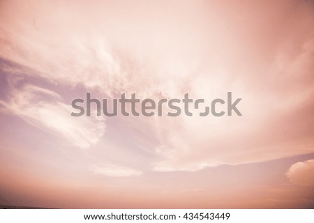 White fluffy clouds in the pink sky style

