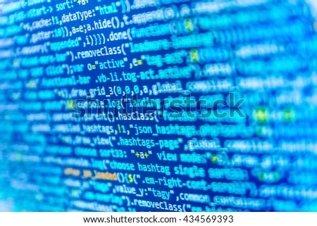 Developer working on program codes in office. Software source code. Computer program. Monitor photo.  Web site codes on computer monitor. Programming code abstract screen of software developer. 
