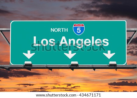 Los Angeles Interstate 5 north highway sign with sunrise sky.