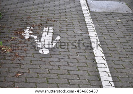 Pedestrian lane road markings on the pavement