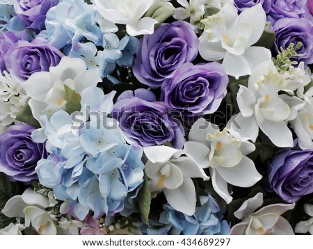 Faded tone of purple and blue flower background