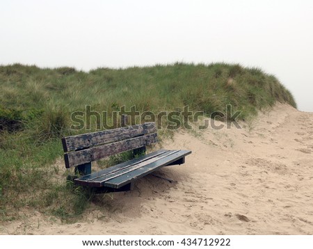 Bench and sand dunes