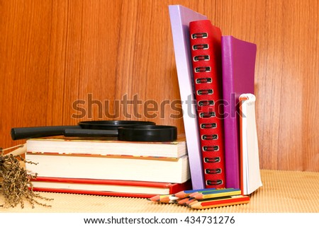 group of book and glass on wood