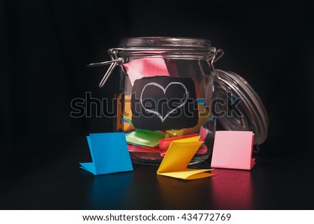 Open Bank with stickers on black background Royalty-Free Stock Photo #434772769