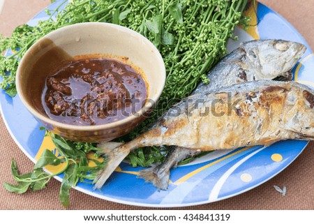 neem leaf food plate taste bitter sauce with fried mackerel