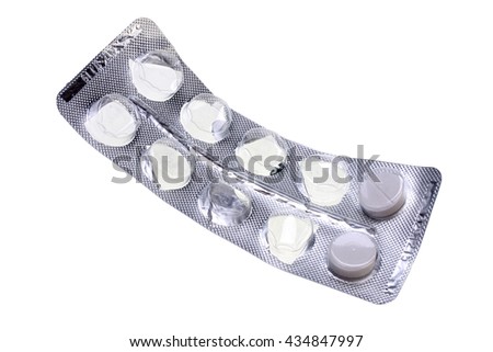 White pills in blister pack on white background with clipping path