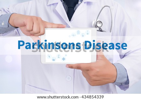 Parkinsons Disease Doctor holding  digital tablet